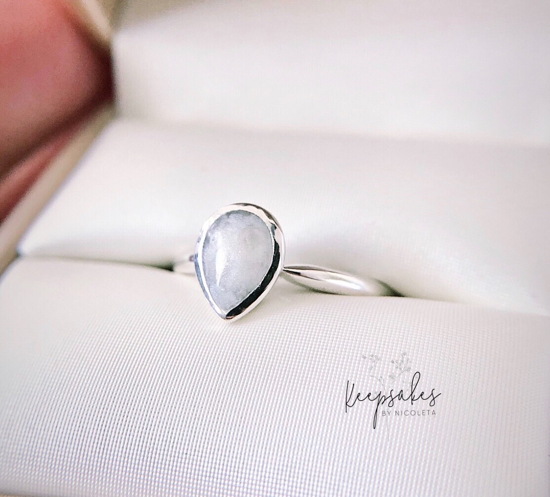 Mini charmed ring with preserved breastmilk and pearl colour keepsake stone