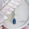 Custom Tears of Joy made with Marquise stone in diamond colour and Pear shape stone in Grecian blue with precious  ashes